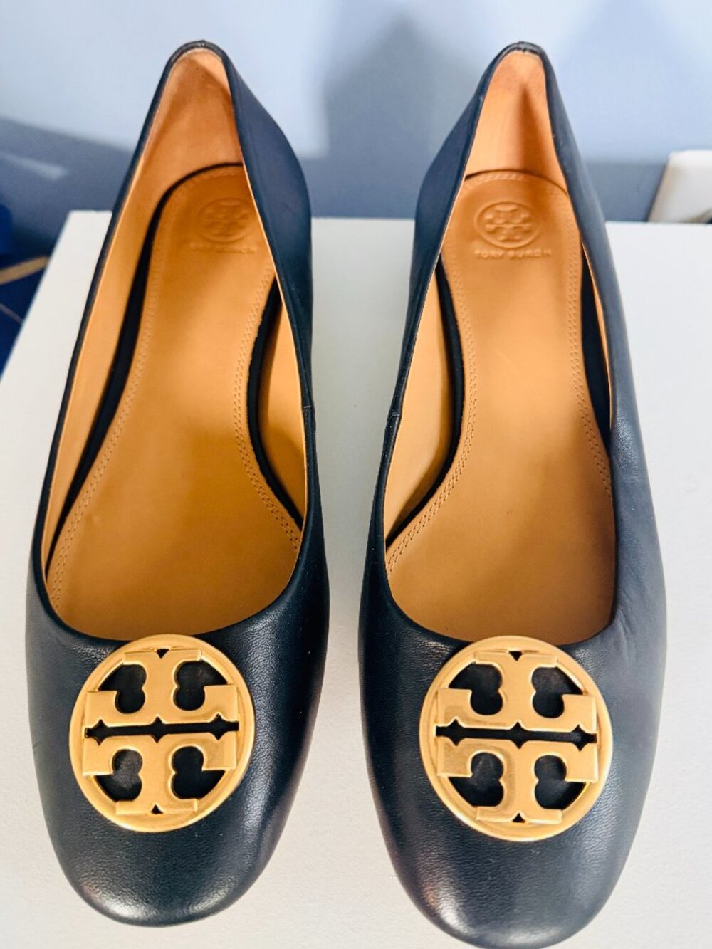 Tory Burch black leather flats. Gold-tone metal logo plaque on the vamp, Size 11